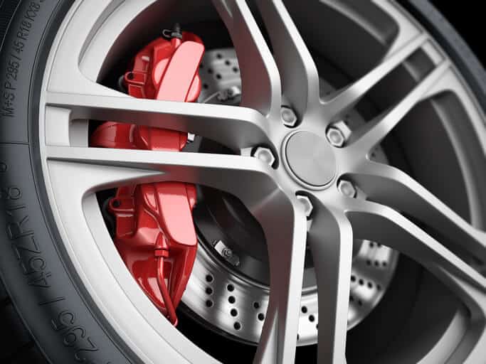 Car wheel and brake system. Red caliper, sport tire.
